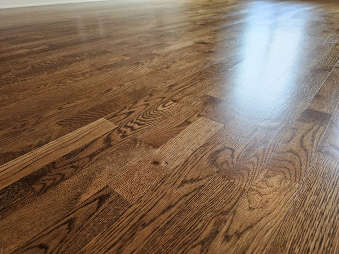 Reviving Elegance: Truman's Hardwood Floor Refinishing Service Leaves Floors Gleaming