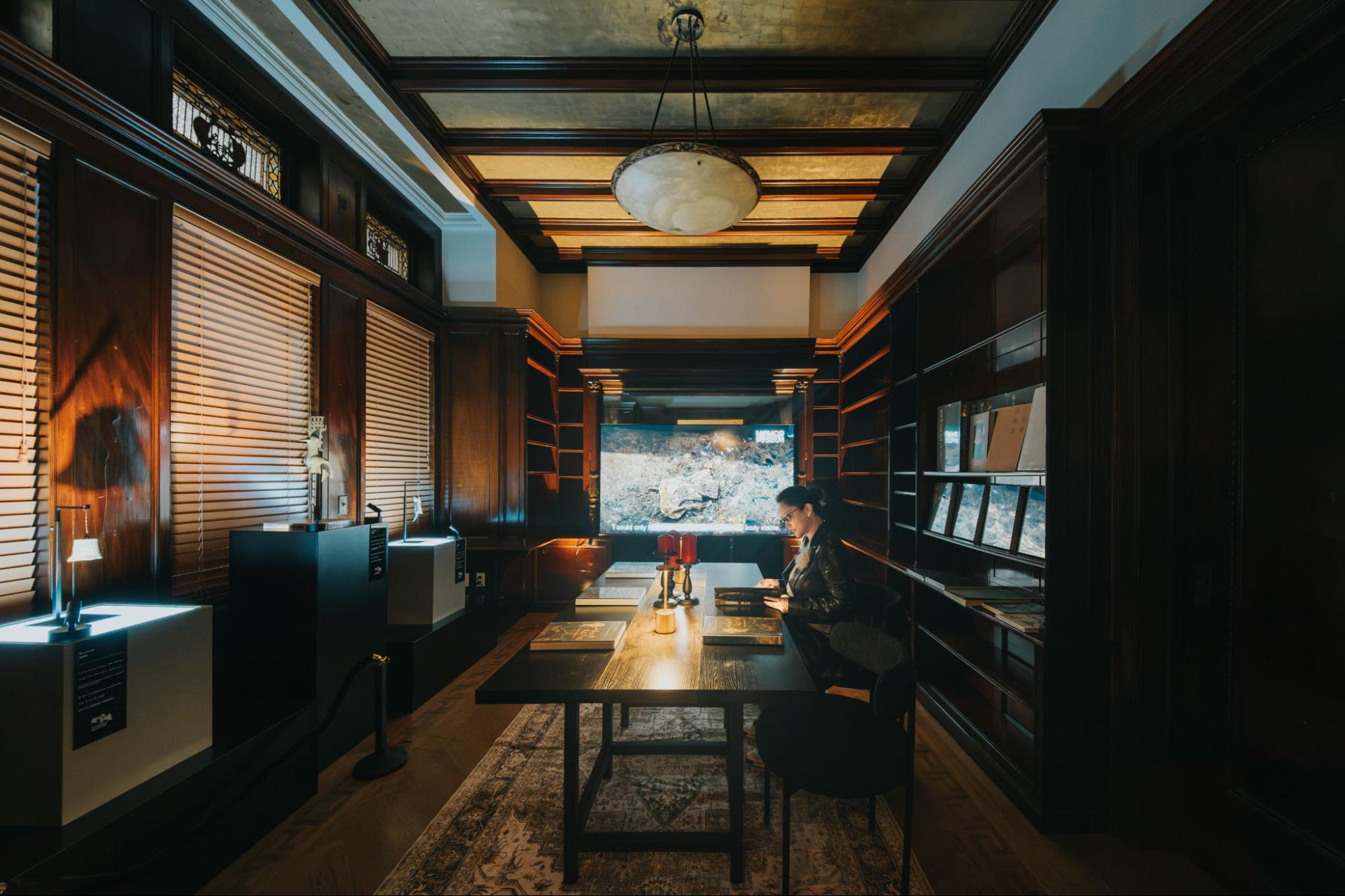 Chief Curator, Willa Ao, in the Floor 2 Reading Room.