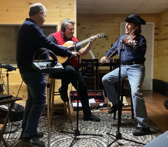 Randall Franks (right) and Wesley Crider (center) rehearse music for “The American’s Creed” at Tim Witt Studios in LaFayette, Georgia. (Randall Franks Media)